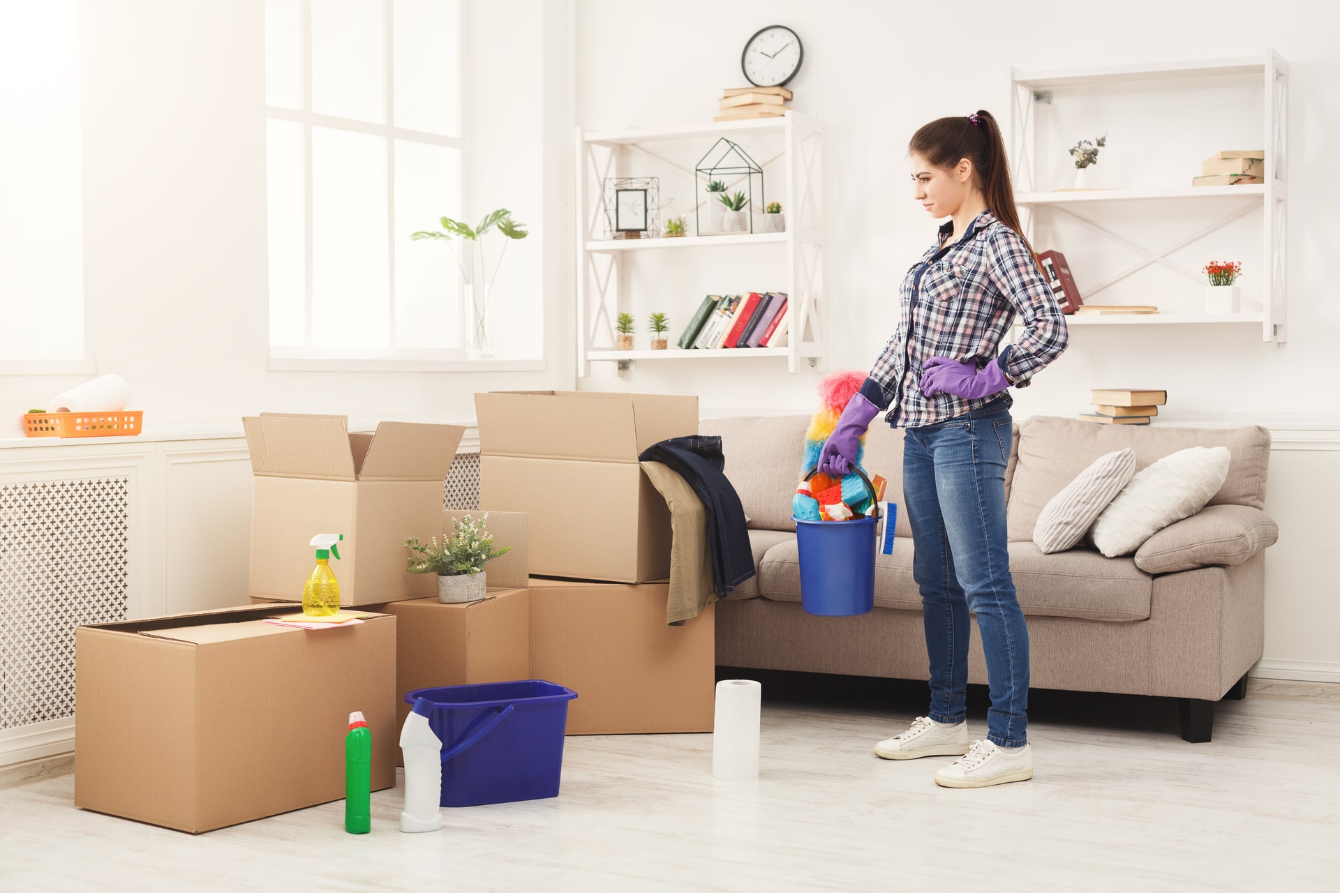 Someone doing a move-out clean of a home